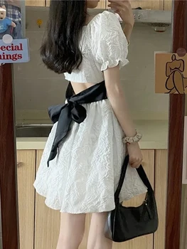 Zoki נשים סקסי הולו לבנה שמלת קיץ ללא משענת קשת קו שמלת אופנה קוריאנית סלים פאף שרוול נקבה מיני Vestidos